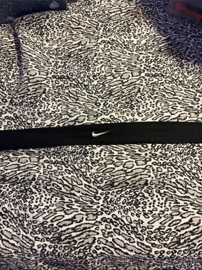 Nike Black Headband with White Swoosh Logo